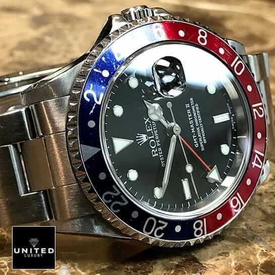 Rolex GMT-Master II 16710 Rolex Submariner GMT-Master II Red & Blue Bezel 16710 Oyster Replica on the Table