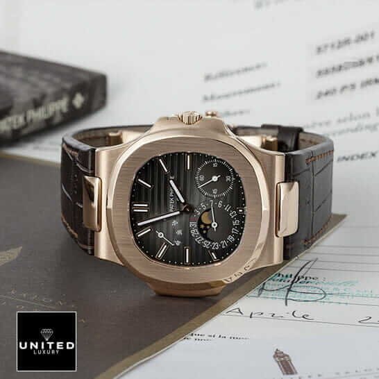 Patek Philippe Nautilus 5712R-001 Patek Philippe 5712R Rose Gold Bezel Black Dial Replica side view