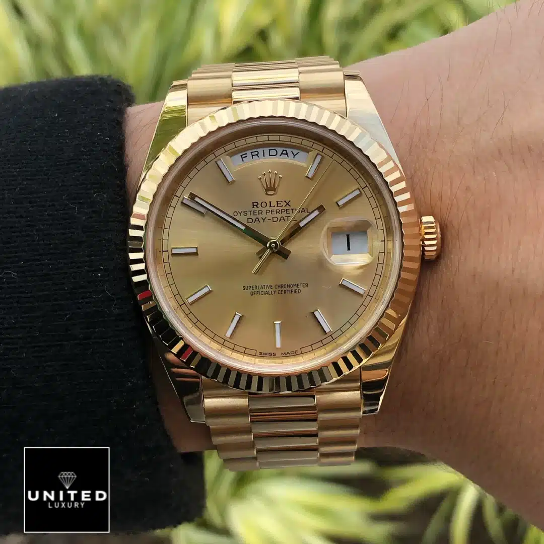 Rolex Day-Date 228238 Rolex Day-Date 40 228238-0003 Champagne Dial Stick Indices Replica on his arm