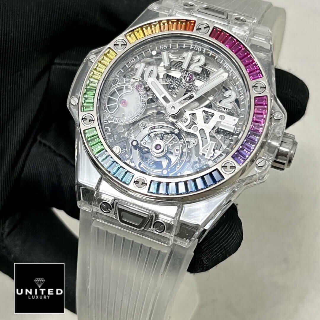 Hublot Big Bang Unico Hublot Big Bang Rainbow Bezel White Rubber Bracelet Replica on the black glove hand