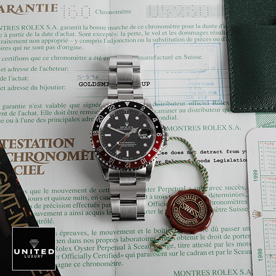 Rolex GMT-Master II 16710 Rolex GMT-Master II Coke 16710 Black & Red Bezel Replica on the warranty certificate