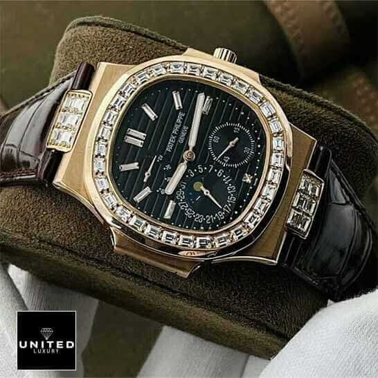 Patek Philippe Nautilus 5724 Patek Philippe Diamond Bezel Black Dial Replica on the stand